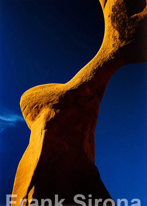 Cloud and Arch Grand Staircase Escalante &copy; Frank Sirona